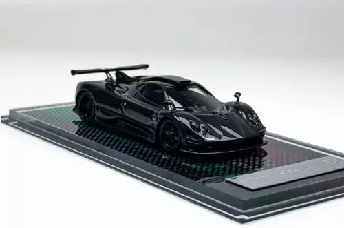 Black racing sports diecast resin model car on display base