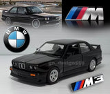 Black BMW M3 E30 diecast model car, front three-quarter view with M3 badge