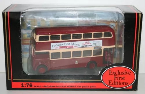 Maroon 1:76 scale diecast double-decker bus model in clear display box