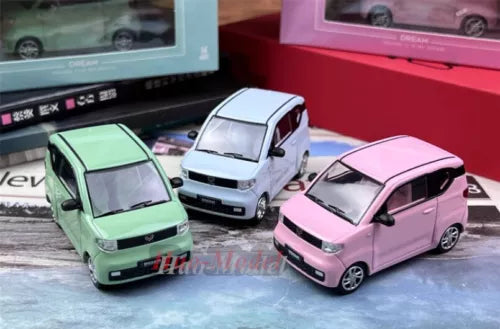 Three 1/64 alloy diecast toy cars: green, white, and pink mini models.