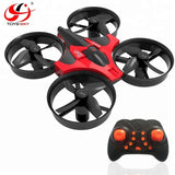 Mini RC quadcopter drone with red body, four black propellers, and black remote controller