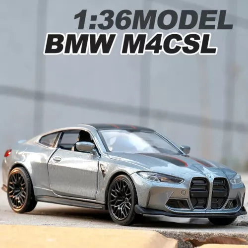 Silver diecast BMW M4 CSL model car, front three-quarter view with detailed grille