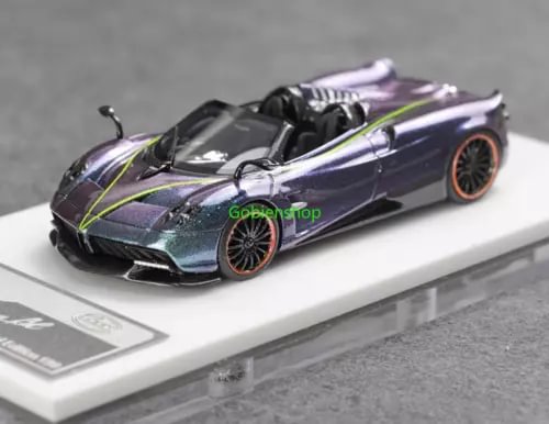 1:64 scale convertible sports diecast car in purple and black with orange wheels