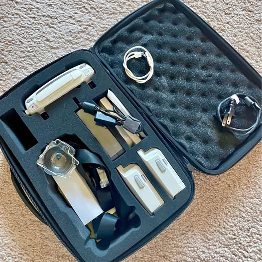 DJI Mavic Pro kit in hard case with foam insert, drone parts, cables, and charger