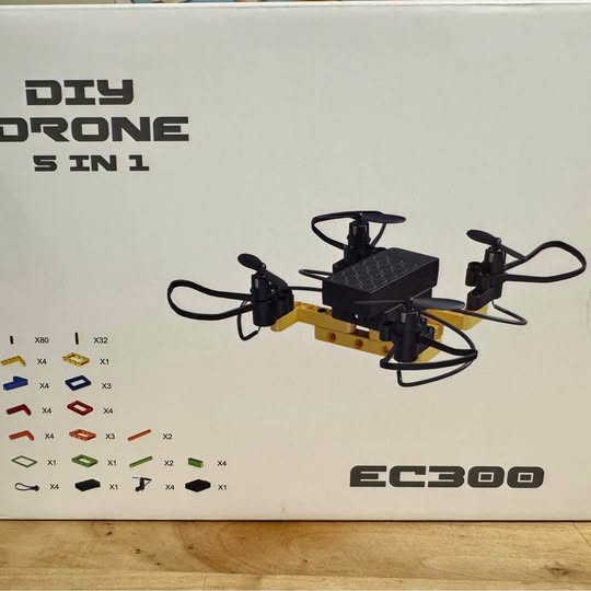 Black and yellow quadcopter drone kit, 5-in-1, EC300