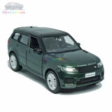 Green SUV diecast model car with front grille and headlights, front three-quarter view