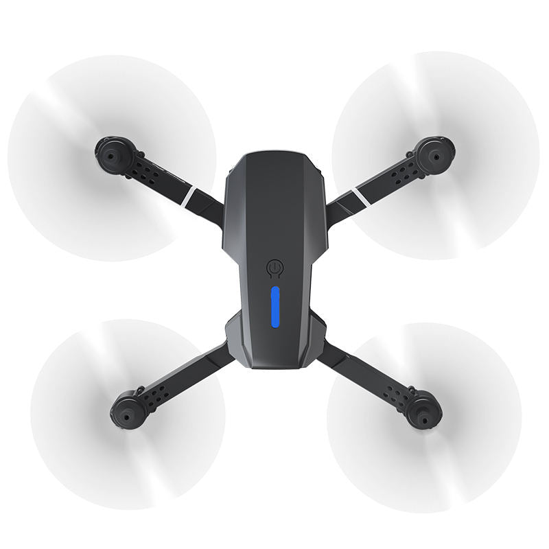 Quadcopter drone with four propellers and dark gray body, compact beginner design
