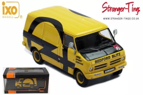 Yellow Bedford Blitz rally assistance 1/43 diecast van model with black side stripes and grille.