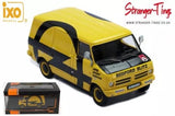 Yellow Bedford Blitz rally assistance 1/43 diecast van model with black side stripes and grille.