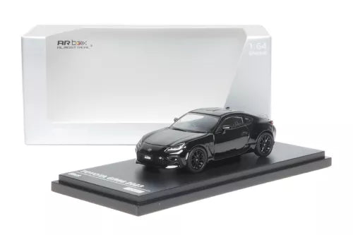 Black diecast sports car model on display base, in presentation box.