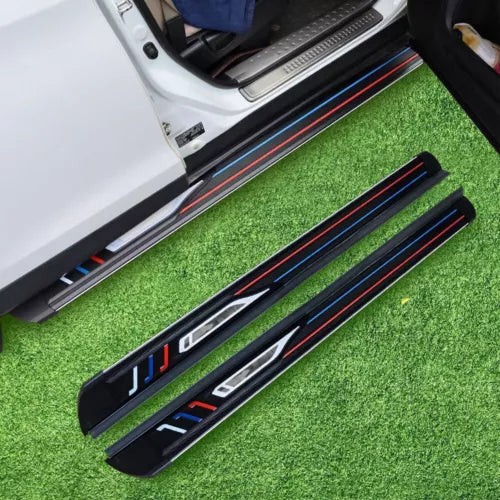 Black toy car side step panels with red and blue stripe detail