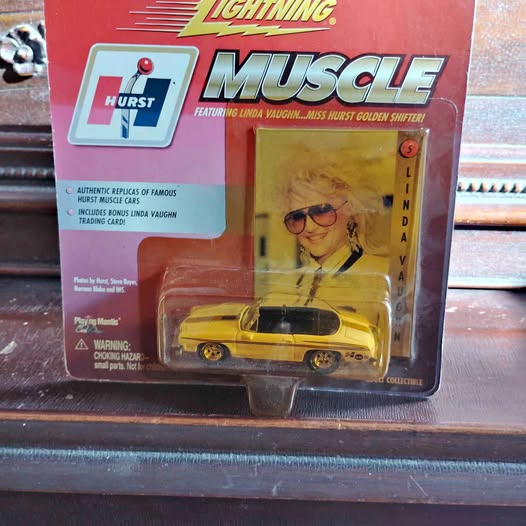 Yellow diecast muscle car in Hurst Lightning blister packaging
