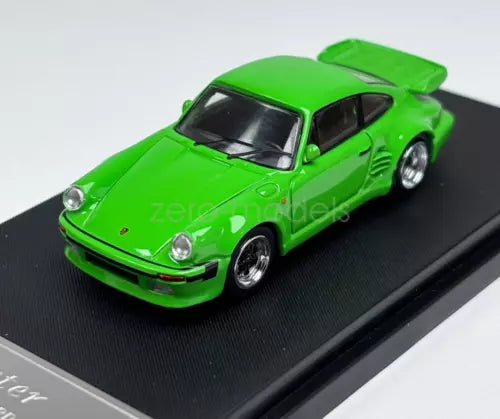 1:64 scale green classic sports diecast car, front three-quarter view