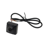 FPV recording camera with black housing and attached wire harness
