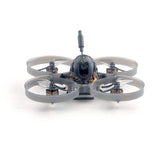 Micro FPV whoop drone with black frame and 4 gray duct arms, antenna