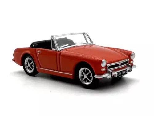 Red MG convertible diecast sports car model with black wheels and chrome grille