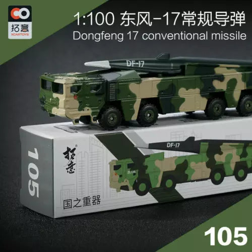 Camouflage diecast DF-17 missile launcher model on display base with markings