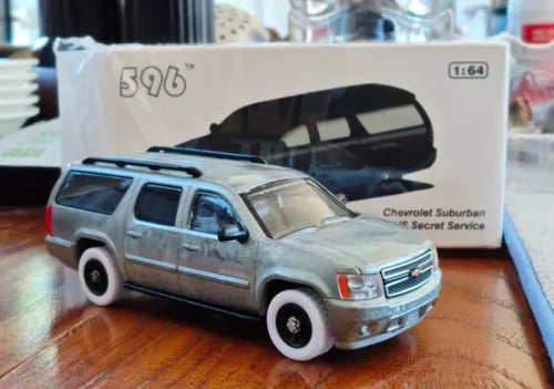 1:64 die-cast SUV model car, light blue with black roof, front view