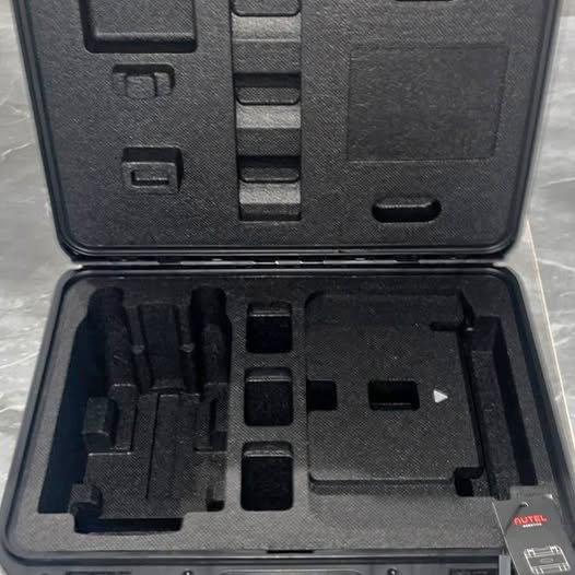 Drone case with open foam insert compartments for accessories
