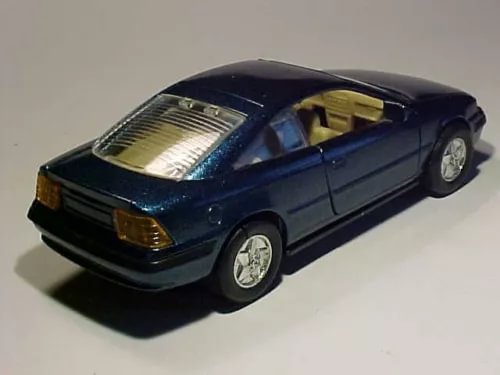 Dark blue 1/36 diecast Opel Calibra model car, detailed coupe front view
