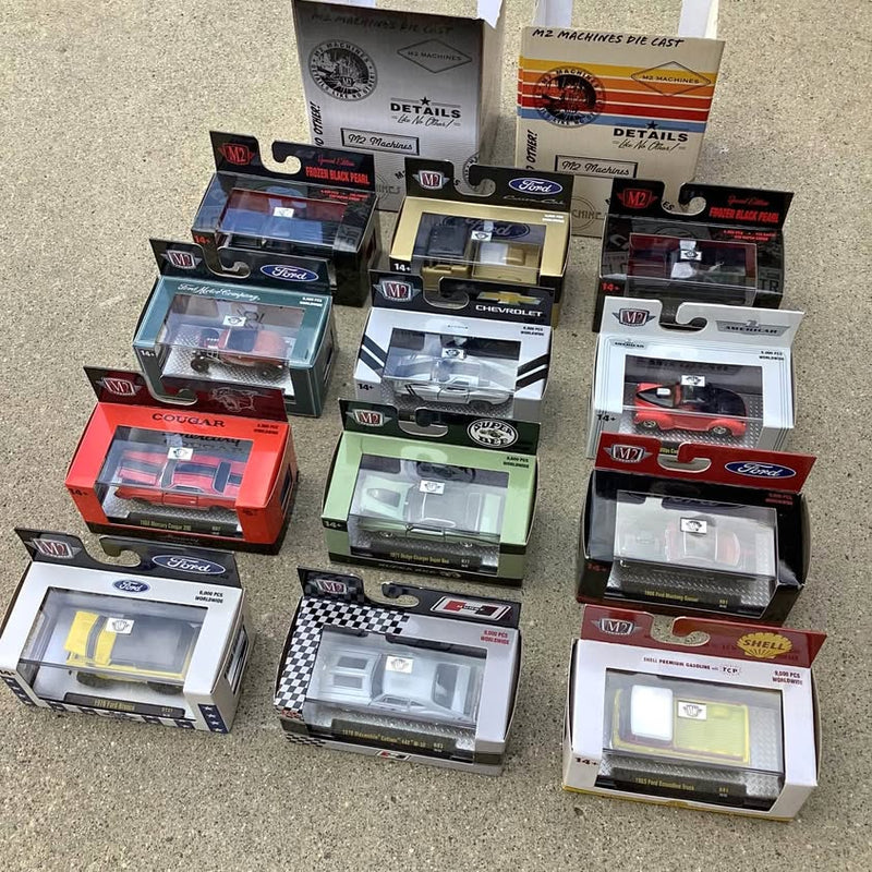 Assorted 1:64 M2 diecast cars in retail boxes, various colors and styles
