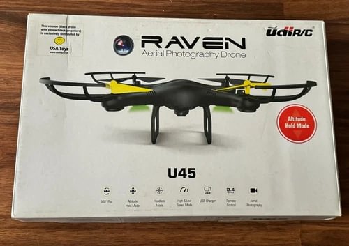 Raven aerial quadcopter drone with HD camera, black body and yellow accents