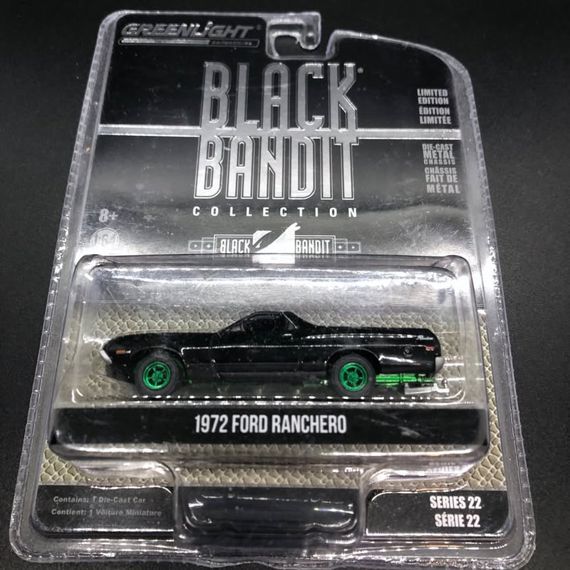 1972 Ford Ranchero diecast model in blister packaging, dark with green wheels.