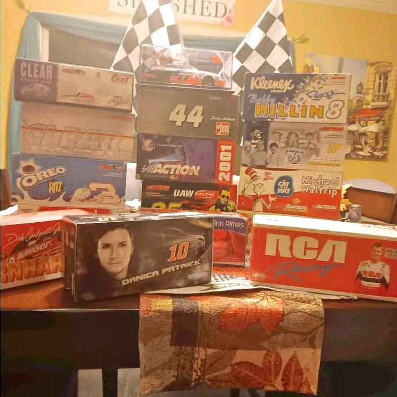NASCAR die-cast toy car in retail packaging with visible number and driver image