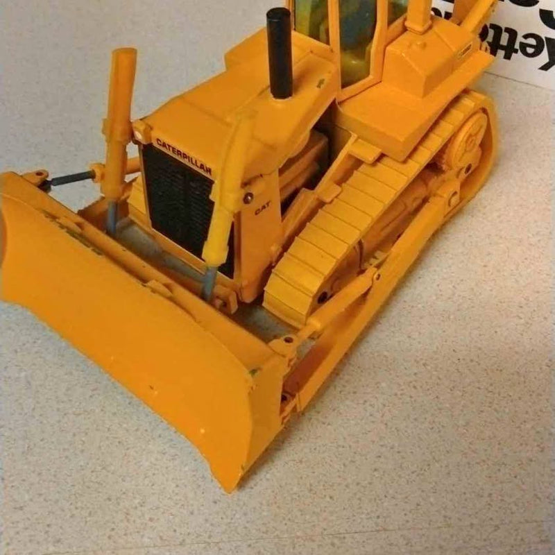 Yellow Cat bulldozer diecast model with front blade, 1/50 scale