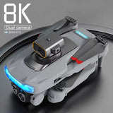 Gray foldable mini quadcopter drone with dual camera and front LED lights