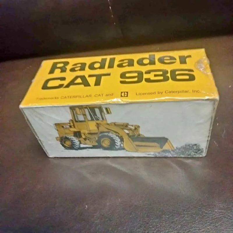 Diecast CAT 9360 loader toy in yellow-and-white retail box