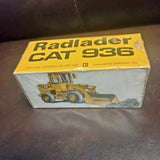 Diecast CAT 9360 loader toy in yellow-and-white retail box