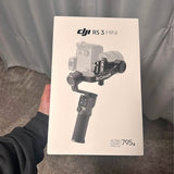 DJI RS 3 Mini gimbal stabilizer retail box with handheld camera rig
