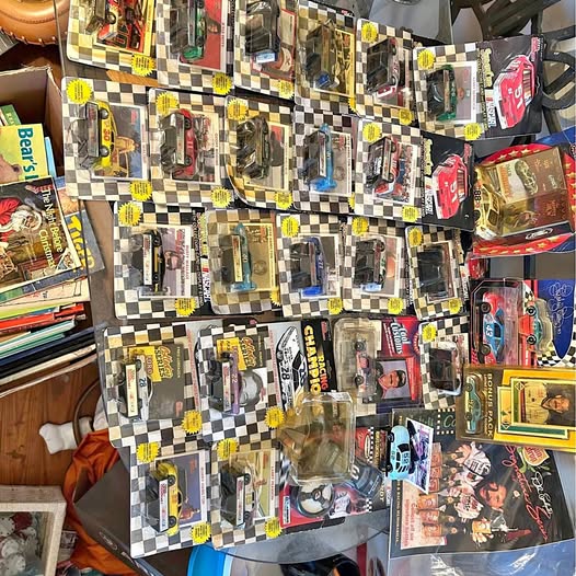 NASCAR diecast car set with many boxed models on card backing