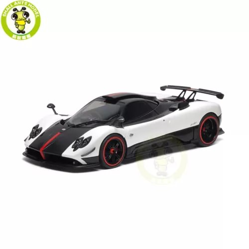 Diecast coupe model car, white body with black accents and red wheels, rear wing