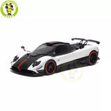 Diecast coupe model car, white body with black accents and red wheels, rear wing