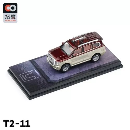 1/64 scale diecast SUV model in maroon and beige, front three-quarter view