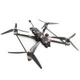 FPV racing drone with four propellers and dark carbon frame
