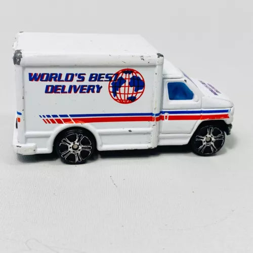 White 1:64 scale delivery step van diecast with blue red stripe and black wheels.