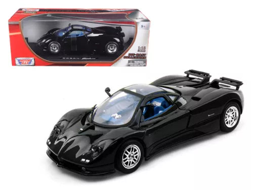 Black diecast model sports car with blue-tinted windows, front-left three-quarter view