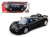 Black diecast sports car model with front three-quarter view and detailed wheels