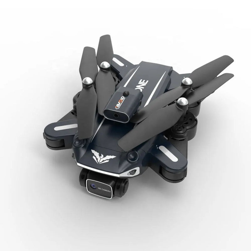 Mini FPV quadcopter drone with four dark propellers and onboard camera
