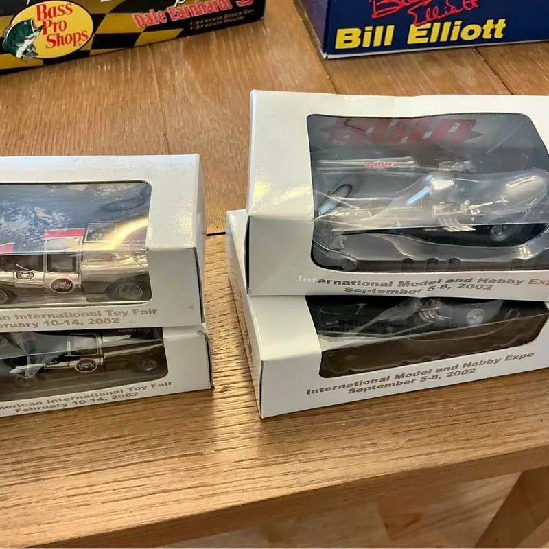 Diecast car model in retail box, showing two boxed vehicles side by side