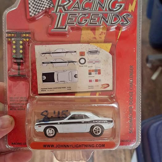 Die-cast car blister pack, white with black stripes, Johnny Lightning
