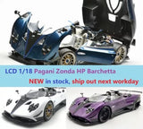 Blue 1/18 scale Pagani Zonda HP Barchetta diecast car with open doors and hood