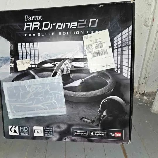 Parrot AR.Drone 2.0 Elite Edition drone box with accessories and app logos
