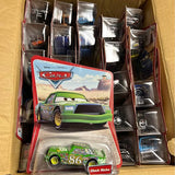 Green die-cast race car #86 in clear blister packaging