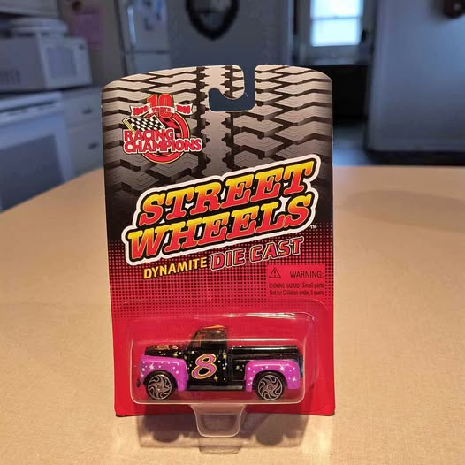 1/64 scale Street Wheels Dynamite diecast car in blister pack, purple #8