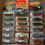 Diecast car set in blister packaging with Hot Wheels and Matchbox models