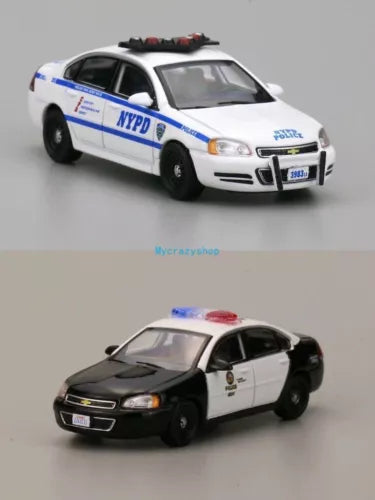 Police sedan diecast car toy in white and black with roof light bar and decals